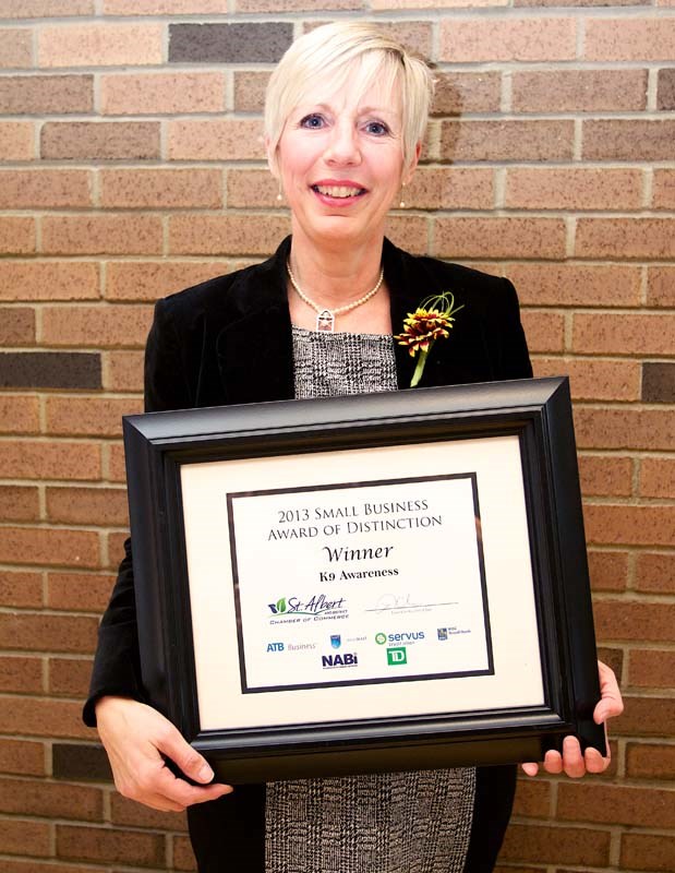 DISTINGUISHED BUSINESS OWNER – Kaytie Stack of K9 Awareness won the Small Business Award of Distinction Thursday at the chamber of commerce&#8217;s annual business award