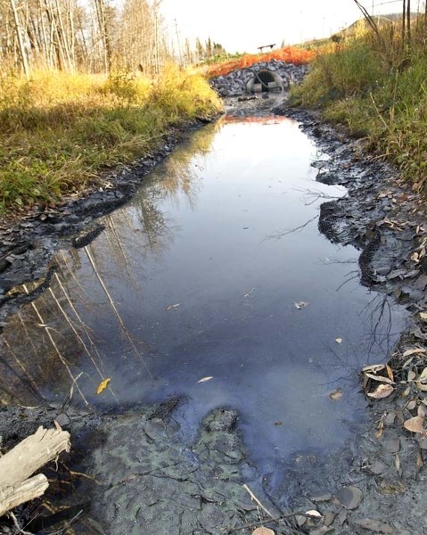 BAD NEWS – Another spill of a stinky fluid has been discovered at Outfall No. 3 in the Riel Industrial Park. It was identified late Friday as being in safe concentrations.