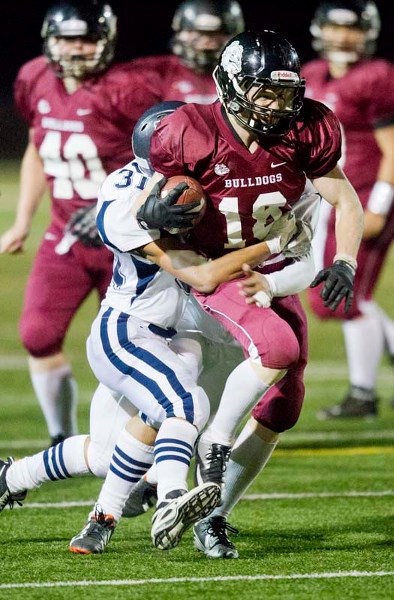WRAPPED UP &#8211; Dylan Shorten of the Bellerose Bulldogs is caught from behind in Thursday&#8217;s 49-7 rout of the Ross Sheppard Thunderbirds at Riel Recreation Park.