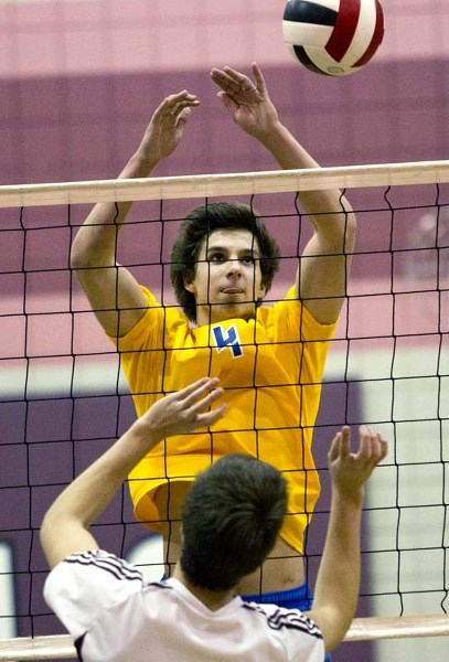 SKY HIGH &#8211; Colin Poirier of the St. Albert Skyhawks jumps for the ball against the Bellerose Bulldogs in Tuesday&#8217;s metro Edmonton division two match. The Skyhawks 