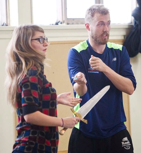 EXPERT SWORDSMAN – Fight director Cliff Kelly of St. Albert works on a sword-fighting sequence with Theatre Prospero&#8217;s cast of Macbeth.
