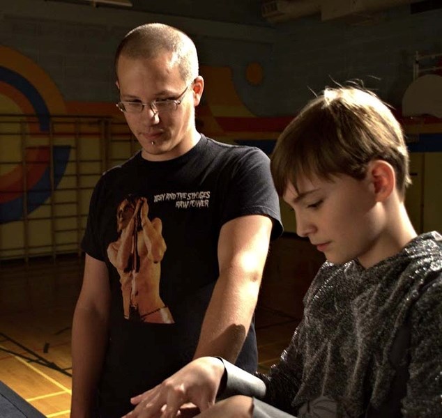 LOCAL MOVIE MAN – Filmmaker Jason Jeffery works with actor Kyle McNalley during a shoot for a music video recently at Leo Nickerson Elementary School.