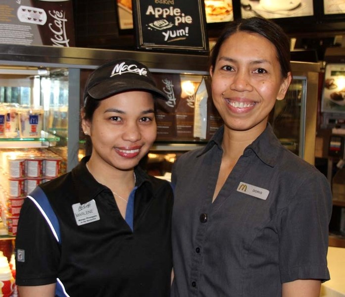 FILIPINO FAMILIES – Marlene Agas and Doris Repotente work at McDonalds on Villeneuve Road. Their families were affected by the recent typhoon. Local McDonalds are raising