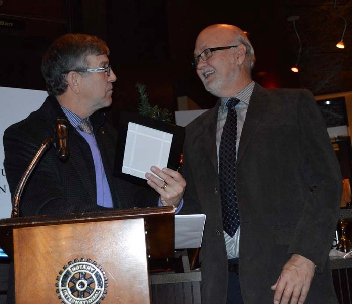 GENEROSITY – St. Albert Mayor Nolan Crouse presents businessman Ron Hodgson with the philanthropy award Sunday.