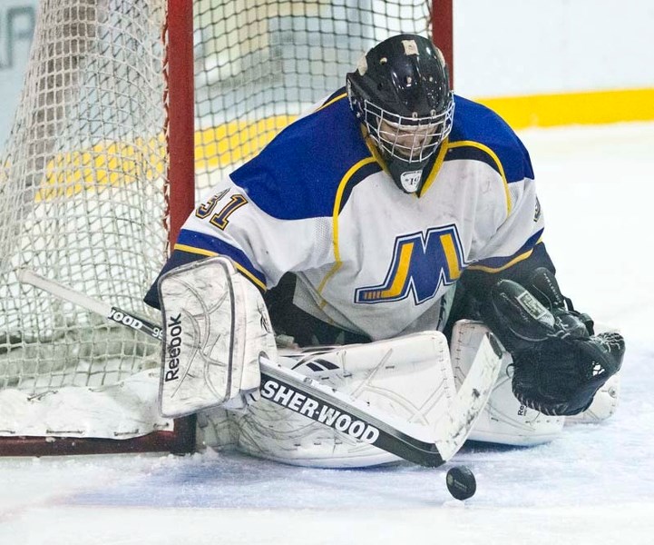 LAST LINE OF DEFENCE &#8211; Justin Pawlenchuk stops the puck for the first-place St. Albert Merchants (18-2-1) in the Capital Junior B Hockey League. The Merchants&#8217;