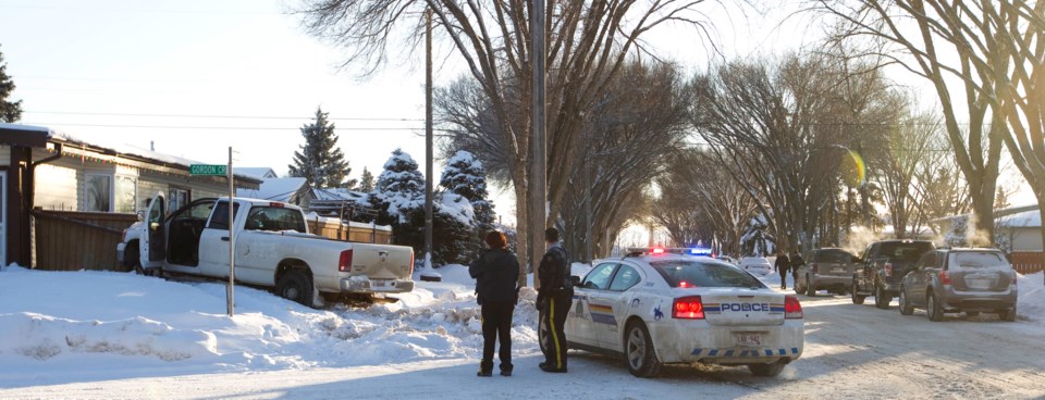 A stolen pick up truck rammed into the fence of a house on the corner of Grosvenor Boulevard and Gordon Crescent Wednesday afternoon after a high speed car chase. A man and a 