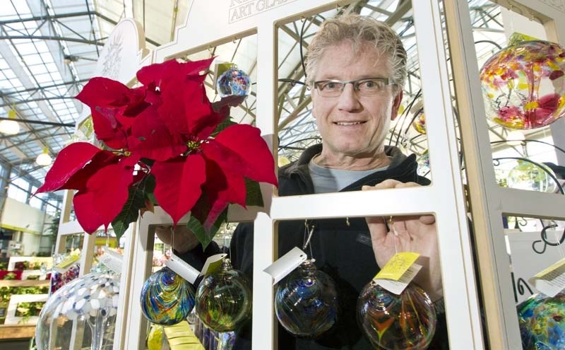 RED POINSETTIA – Jim Hole of the Enjoy Centre says the classic red poinsettia is still the dominant holiday plant.