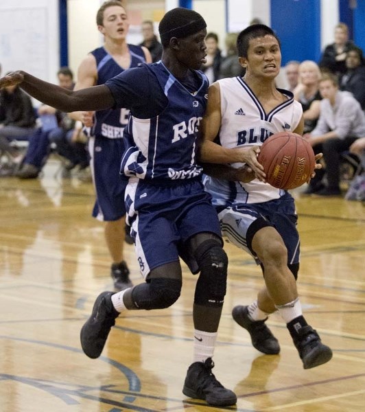 HOOP DRIVEN &#8211; Frankie White of the Paul Kane Blues charges to the basket against the Ross Sheppard Thunderbirds in Monday&#8217;s metro Edmonton division one opener at