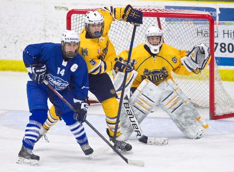 NET DEFENCE &#8211; Jayden Platz of the St. Albert Gregg Distributors Sabres keeps close tabs on Marek Skvrne