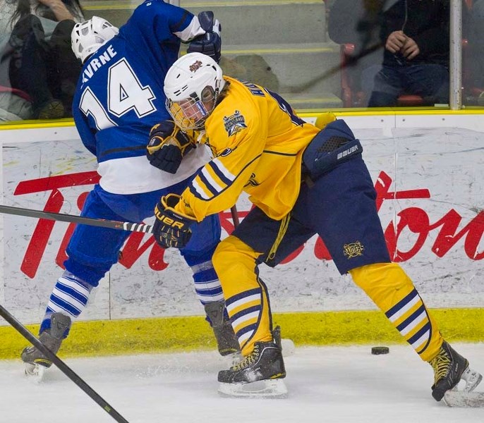PLAYING THE BODY &#8211; Evan Haimila of the St. Albert Gregg Distributors Sabres gets physical in Thursday&#8217;s 2-2 draw with HC Kometa Brno of the Czech Republic at the