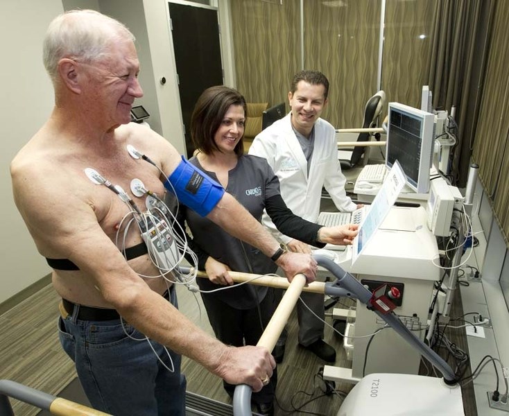 HEART OF THE MATTER – Dr. Abboud Fahoum and nurse Lori Hart run a stress test on Del Huchulak at Cardio Connect