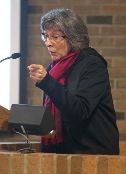 TENSION – Erin Ridge resident Sandy Scott expresses her anger and frustration with city staff and council on Monday night during St. Albert city council&#8217;s discussion on 