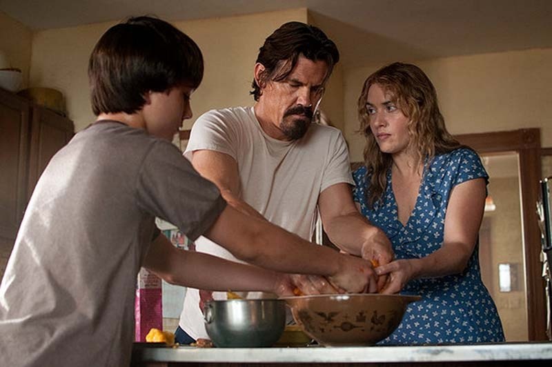 HUMAN CONNECTION – Labor Day is a touching movie about the family bond that develops between an escaped killer and a single mother and her son.