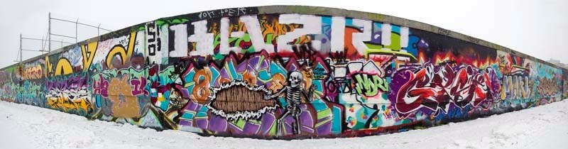 GRAFFITI WALL – This wall in Edmonton – part of a pilot project – is a place where graffiti artists can legally express themselves.