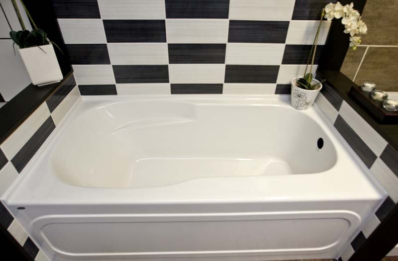 MODERN TWEAKS – Bathtubs are deeper than they used to be and have steep sides that drop straight down.