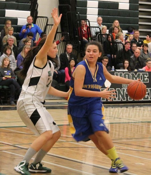 ONE-ON-ONE &#8211; Riki Steward of the St. Albert Skyhawks is covered by Vanessa Wild of the Spruce Grove Panthers in Saturday&#8217;s final at the Panther Classic. With only 