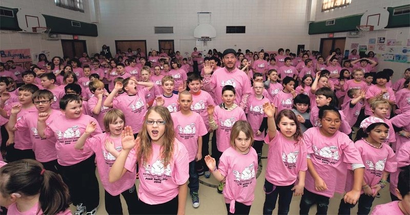 SEA OF PINK – Albert Lacombe students recite an anti-bullying oath (written by students) as part of Pink Shirt Day Wednesday. The whole school dressed in pink shirts on this