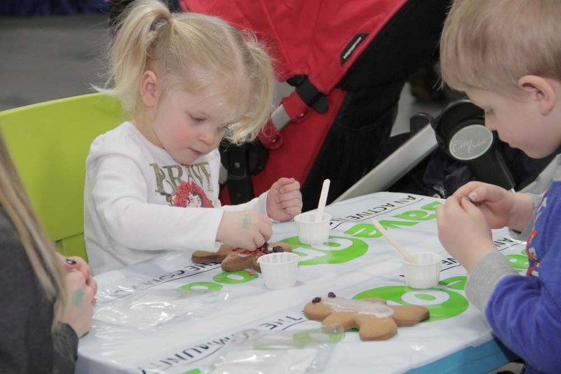 BAKING – Kids loved the cookie decorating activity at the Mom
