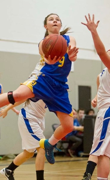 SOARING TO VICTORY &#8211; Nicole Harrison goes airborne for the St. Albert Skyhawks in Saturday&#8217;s metro Edmonton divison one junior final against the Harry Ainlay