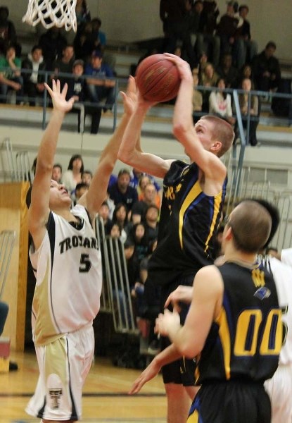 GOING TO THE HOOP &#8211; Jordan Morrison of the St. Albert Skyhawks gives it his best shot for a basket in Friday&#8217;s metro Edmonton division two final against the Holy