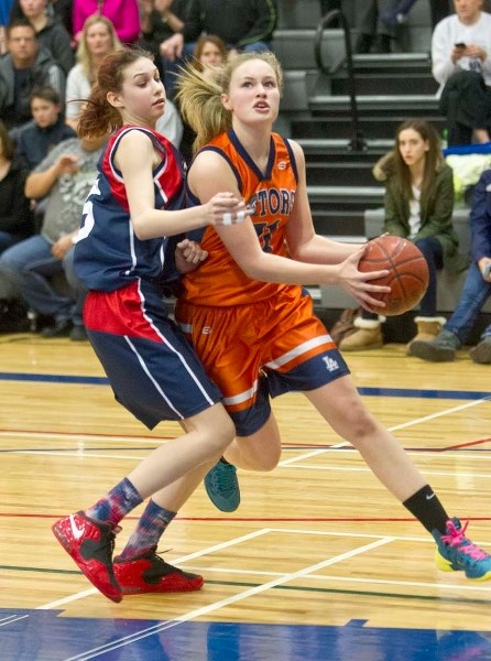 POWER PLAY &#8211; Lily Armstrong of the the Lorne Akins Gators drives to the basket against Sarah Dedrick of the Vincent J. Maloney Marauders in the SAPEC junior high Tier 1 