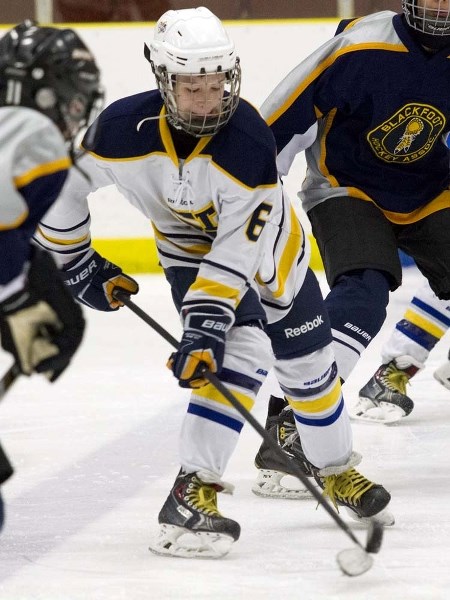 STICKHANDLER &#8211; Matt Reidy of the St. Albert Saints controls the puck in Sunday&#8217;s semifinal against the Blackfoot Chiefs at the Hockey Alberta peewee AA provincial 