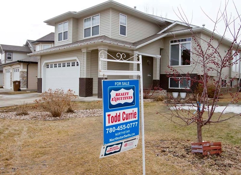 SIGNS OF SPRING – Spring always brings a slew of &quot;For sale&quot; signs on lawns across St. Albert