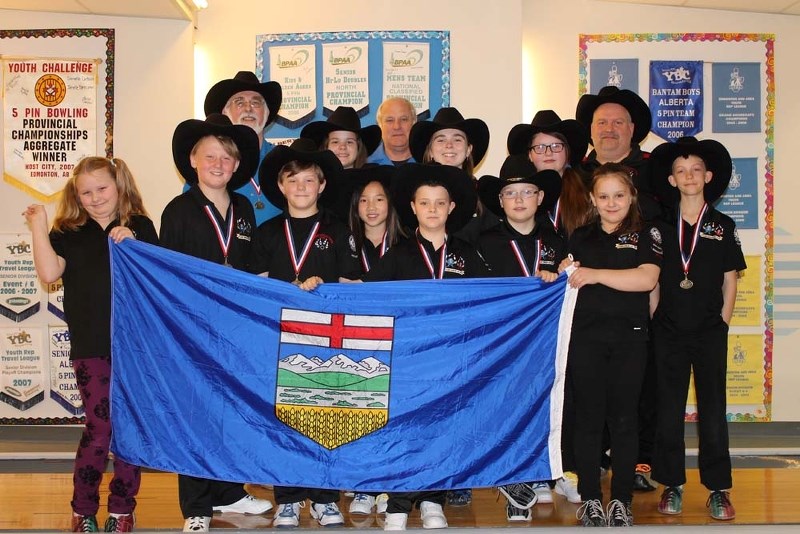 ALLEY CATS &#8211; Bowlers and coaches from the St. Albert Bowling &amp; Rec Centre show off their provincial colours in the last function before the 50th annual Youth