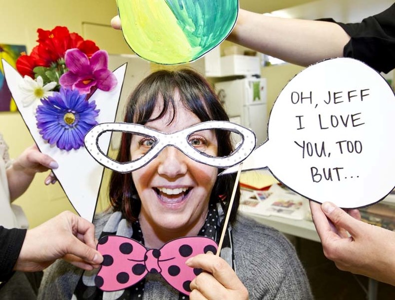 HIGH ENERGY – Julie Kaldenhoven and other staff of the Art Gallery of St. Albert prepare a photo booth that will be part of the High Energy exhibit