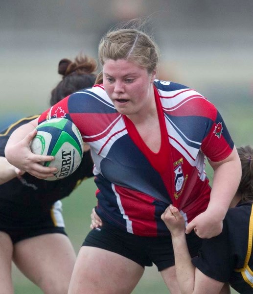 DRIVING FORCE &#8211; Danica Dreger of the St. Albert Rugby Football Club attacks with purpose in Wednesday&#8217;s 19-17 victory over Crude/West in the Edmonton Rugby Union