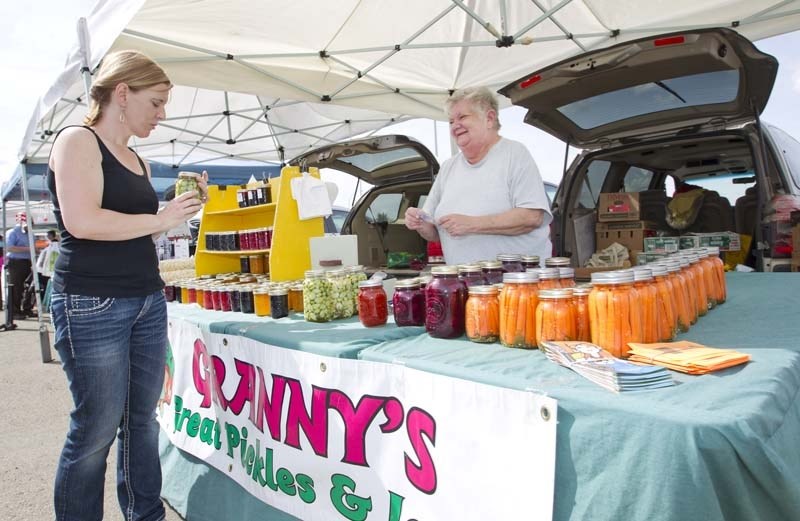 PICKLES AND JAMS – St. Albert resident Andrea Beach displays her wares at her Granny&#8217;s Great Pickles and Jams booth at Castle Downs Farmers&#8217; Market.