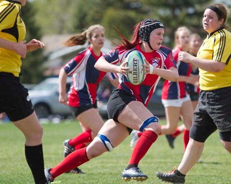 POWER RUNNER &#8211; Megan Lauer of St. Albert turns on the jets against the Grande Prairie Sirens in Saturday&#8217;s match at Alpine field. St. Albert won 47-22 to improve