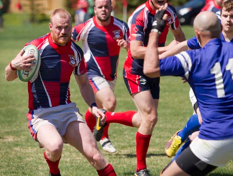 BUSTING A MOVE &#8211; Matt Herod of St. Albert weaves his way towards a try in the first half of Saturday&#8217;s 15-13 loss to the Pirates in the Edmonton Rugby Union