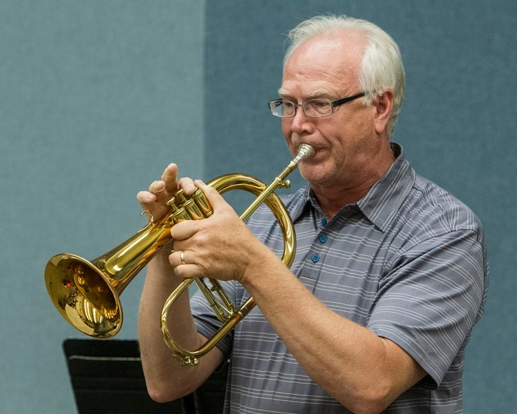 HORN TIME – Tom Smyth is retiring as conductor of the Saint City Big Band. However