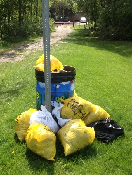 CLEANUP EFFORT – More than 100 bags of garbage were taken out of Gloucester Park thanks to residents&#8217; efforts.