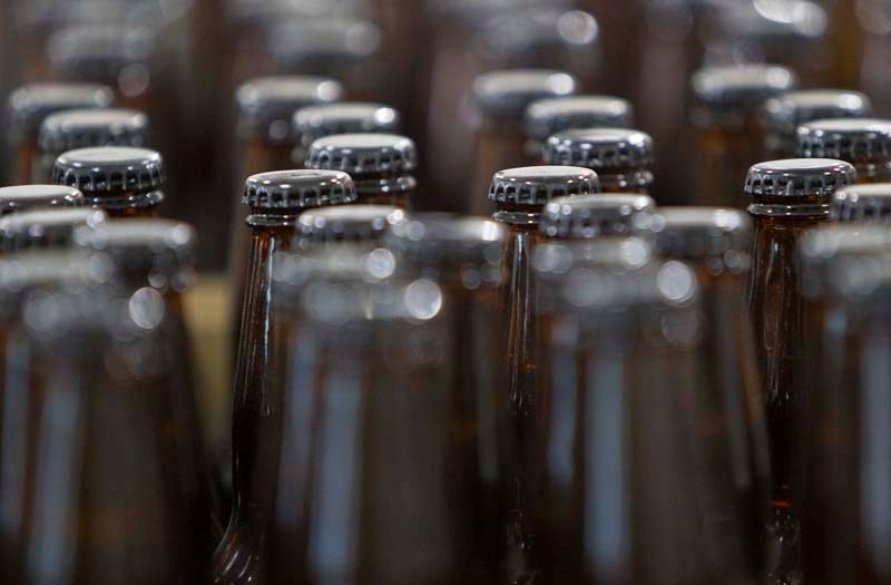 99 BOTTLES – Bottles of beer await shipment at Hog&#8217;s Head Brewing Company