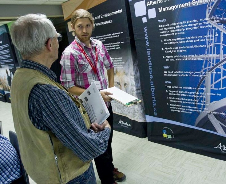 RIVER PLANNING – Stantec consultant Andre Fehr talks with a member of the public during an open house at the St. Albert Community Hall on Wednesday. Residents were asked to