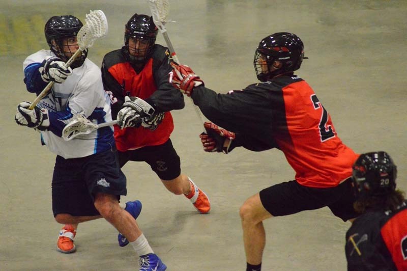 DEFENDING THE FLOOR &#8211; Derek Draper (left) and Lucas Huyser-Wierenga of the St. Albert Miners pressure the Calgary Mountaineers&#8217; player in Sunday&#8217;s senior B