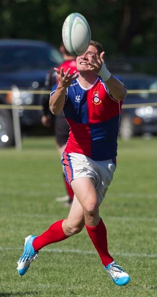 PLAYING CATCH &#8211; Duncan Maguire of the Team Canada sevens and prolific winger for the St. Albert Rugby Football Club reels in the ball during Saturday&#8217;s 43-5