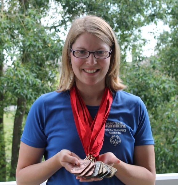 CHAMPION – Michelle Tschetter is representing Team Alberta this week in swimming at the Special Olympics&#8217; Summer Games in Vancouver. She&#8217;s no stranger to the