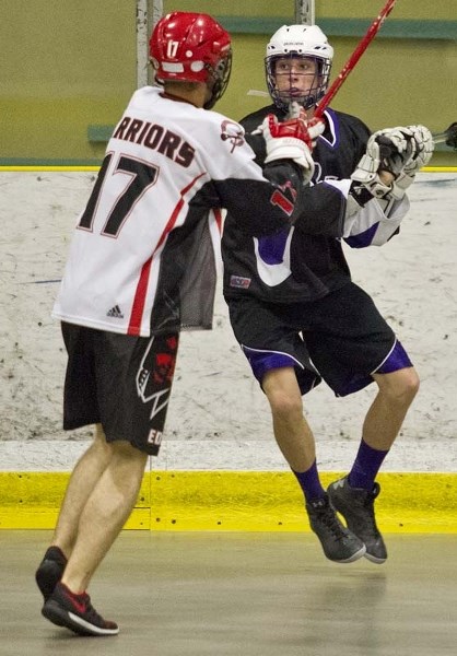 St. Albert Crude played Edmonton Warriors Saturday afternoon in an intense game at Akinsdale Arena. The Crude&#8217;s Daniel Pele is pressured by the Warriors&#8217; Taylor