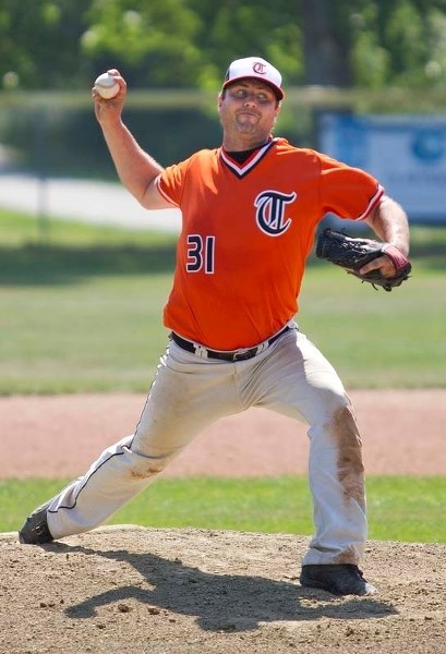 HERE&#8217;S THE PITCH – St. Albert Tigers Matt Rindero delivers a pitch against the Blue Willow Angels at Legion Memorial Park last Satuday. The host Tigers ended up winning 