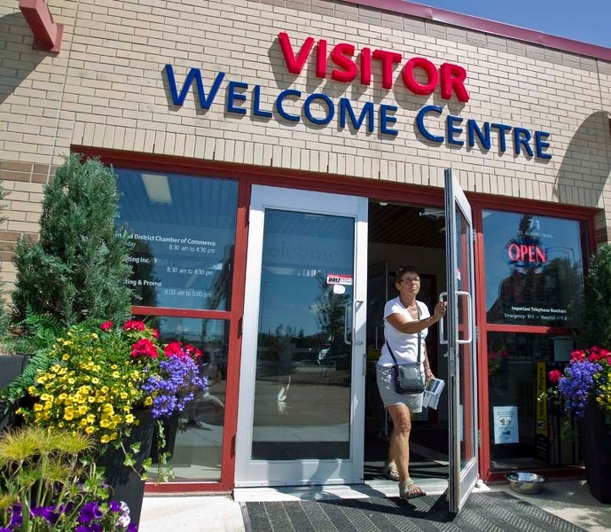 WELCOME – Whitecourt resident Judy Siegers exits the St. Albert Visitors&#8217; Welcome Centre on Thursday. The centre has been operating since May and recently got a new