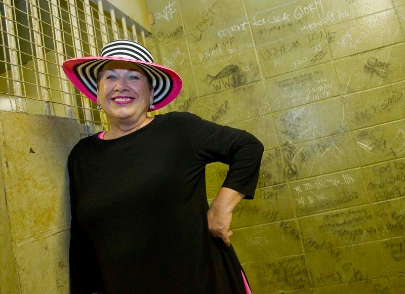 Carol Watamaniuk stands inside an old RCMP jail cell in the Hemingway Centre. Watamaniuk and VASA had been protesting the renovations to the cell.