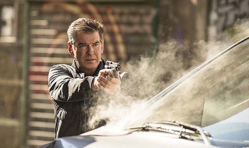 Pierce Brosnan and Olga Kurylenko