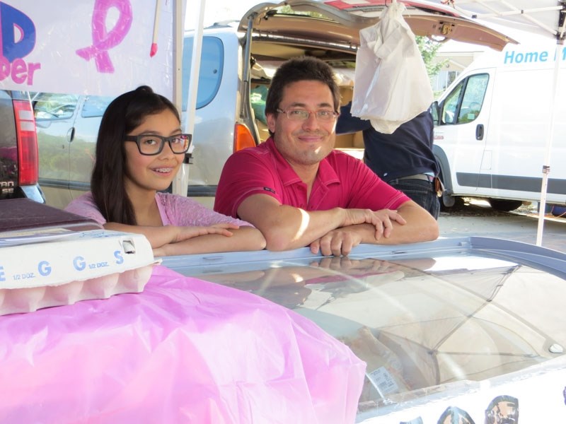 PARTNERS – Isabella Miranda in partnership with her father Paul are standbys at the St. Albert Farmers&#8217; Market where they sell fresh and frozen organically raised
