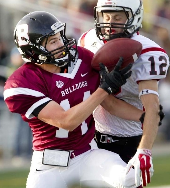 CATCH OF THE DAY &#8211; Ben Hoffman of the Bellerose Bulldogs squeezes the ball in the endzone for a second-quarter touchdown reception against the Salisbury Sabres in