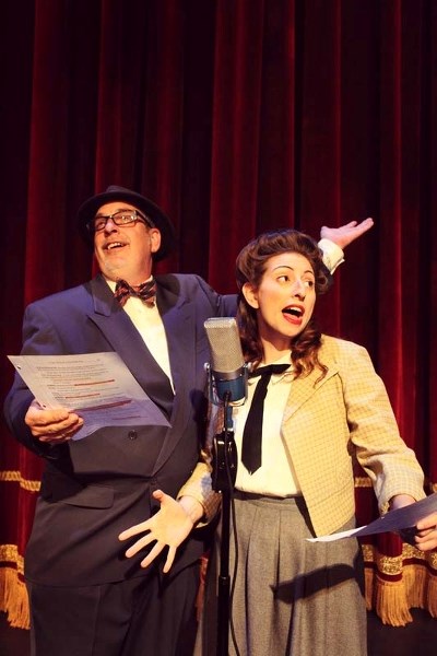 – Edmonton actors Rachel Kent and Andy Northrup get into character for Vintage Hitchcock: A Live Radio Play at Fort Edmonton Park&#8217;s Capitol Theatre.