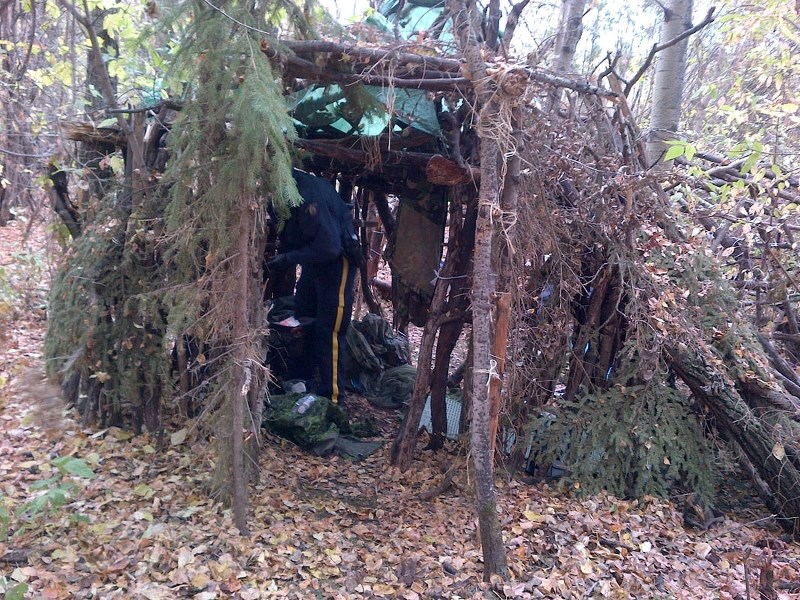 HOME AWAY FROM HOME – A&quot;fort&quot; found in the woods near the ball diamonds. This was the site of the arrests.