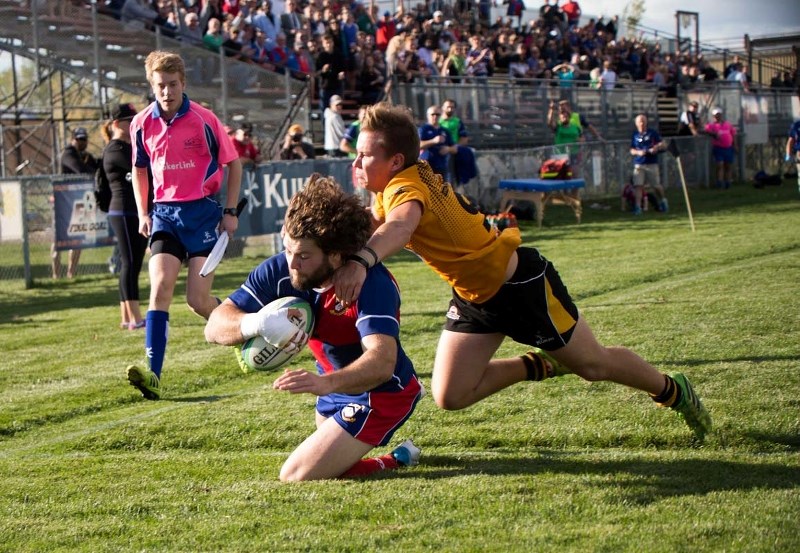 MAN OF THE MATCH – Adam Bontus of the St. Albert premier men&#8217;s team beats a Calgary Hornet to the try area in the first half of the Labatt&#8217;s Cup provincial final